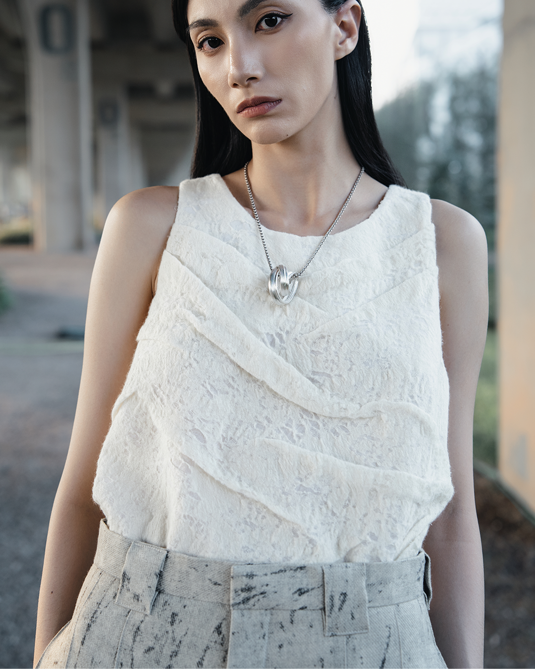 :\\ distressed hand-draped knit top